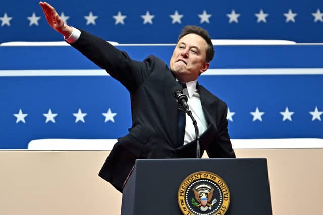 Elon Musk makes a gesture compared by some to a Nazi salute while speaking at the Capitol One Arena in Washington on the day of Donald Trump's inauguration as US President (Picture: Angeal Weiss)