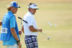 Luke Poulter pictured caddying for his dad Ian in  practice round prior to The 150th Open at St Andrews 