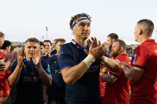 Jamie Ritchie applauds the Edinburgh fans after the victory.