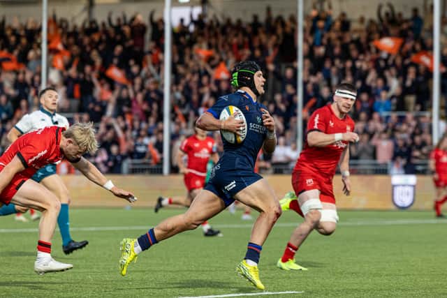 Edinburgh's Darcy Graham scores his sides seventh try of the match.