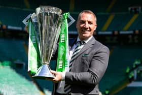 Celtic manager Brendan Rodgers with the William Hill Premiership trophy after the 1-1 draw with St Mirren. (Photo by Ross MacDonald / SNS Group)