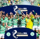 Celtic's Callum McGregor and James Forrest lift the William Hill Premiership trophy after the 1-1 draw with St Mirren. (Photo by Alan Harvey / SNS Group)