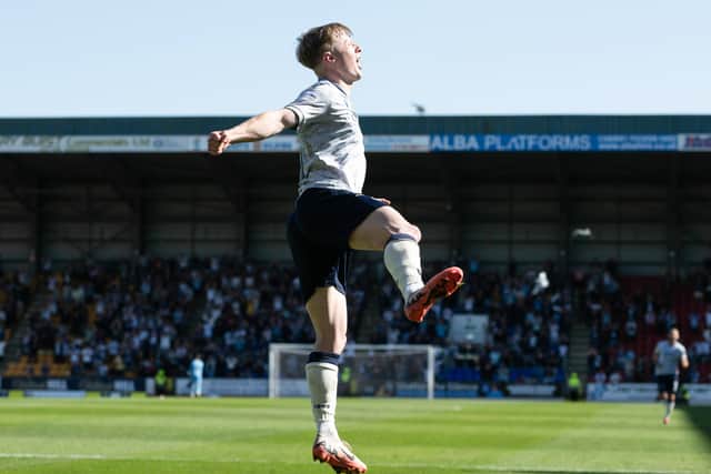 Lyall Cameron scored twice for Dundee as they took down St Johnstone in Perth.