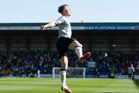 Lyall Cameron scored twice for Dundee as they took down St Johnstone in Perth.