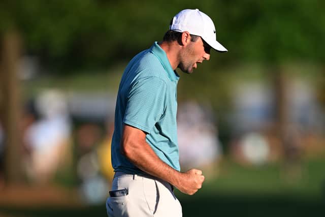World No 1 Scottie Scheffler reacts on the 18th green after a closing birdie in the third round of the PGA Championship at Quail Hollow Country Club in Charlotte, North Carolina