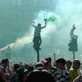 Celtic fans celebrate outside Celtic Park following the William Hill Premiership match at Celtic Park, Glasgow. Picture date: Saturday May 17, 2025. PA Photo. See PA story SOCCER Celtic. Photo credit should read: Jane Barlow/PA Wire.RESTRICTIONS: Use subject to restrictions. Editorial use only, no commercial use without prior consent from rights holder.