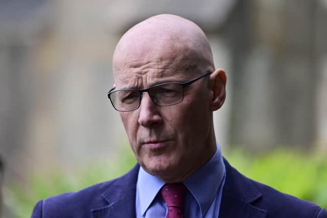 First Minister John Swinney campaigning in Hamilton for the SNP ahead of a crunch by-election. Photo by John Devlin  