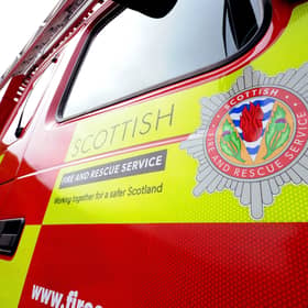 Firefighters are battling a grass blaze in the Highlands