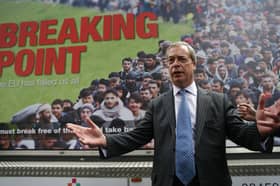 Nigel Farage stands in front of a controversial campaign poster ahead of the 2016 Brexit referendum (Picture: Daniel Leal)