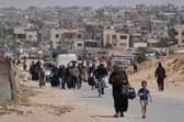 Displaced Palestinians flee Khan Younis, Gaza, amid the ongoing Israeli military offensive in the area