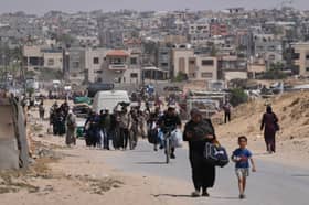 Displaced Palestinians flee Khan Younis, Gaza, amid the ongoing Israeli military offensive in the area