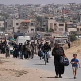 Displaced Palestinians flee Khan Younis, Gaza, amid the ongoing Israeli military offensive in the area