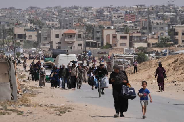 Displaced Palestinians flee Khan Younis, Gaza, amid the ongoing Israeli military offensive in the area