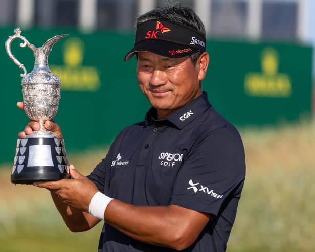 Korea’s KJ Choi proudly shows off the trophy after winning last year’s Senior Open Championship presented by Rolex at Carnoustie Golf Links 