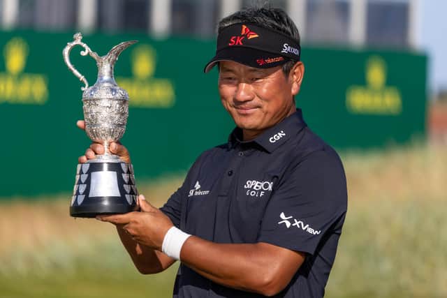 Korea’s KJ Choi proudly shows off the trophy after winning last year’s Senior Open Championship presented by Rolex at Carnoustie Golf Links 