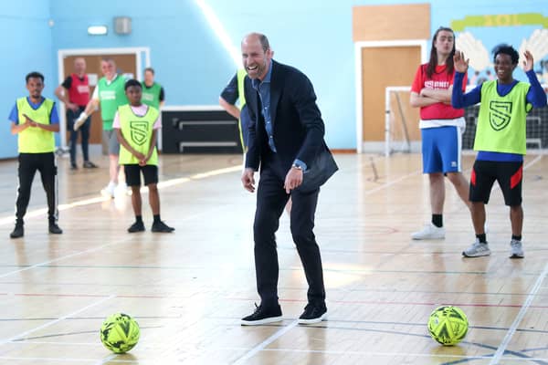 The Prince of Wales, known as the Duke of Rothesay when in Scotland, plays football during a visit to Leith Community Centre in Edinburgh. Picture: Chris Jackson/PA Wire