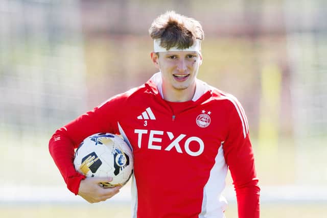 Aberdeen's Jack MacKenzie sports a head bandage during a training session at Cormack Park, on May 21, 2025. (Photo by Ross Parker / SNS Group)