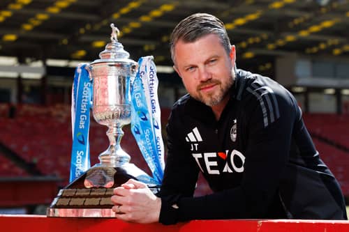 Aberdeen manager Jimmy Thelin with the Scottish Gas Scottish Cup at Pittodrie Stadium, on May 21, 2025. (Photo by Ross Parker / SNS Group)