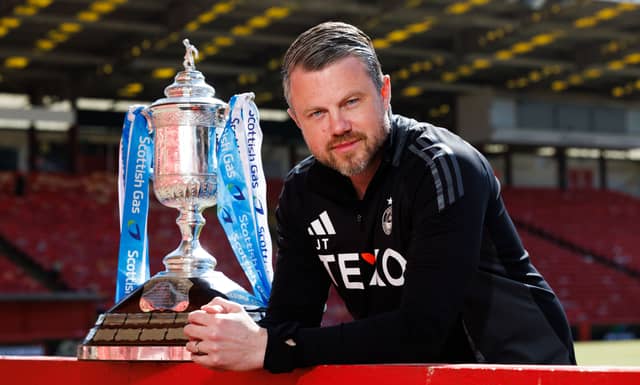 Aberdeen manager Jimmy Thelin with the Scottish Gas Scottish Cup at Pittodrie Stadium, on May 21, 2025. (Photo by Ross Parker / SNS Group)