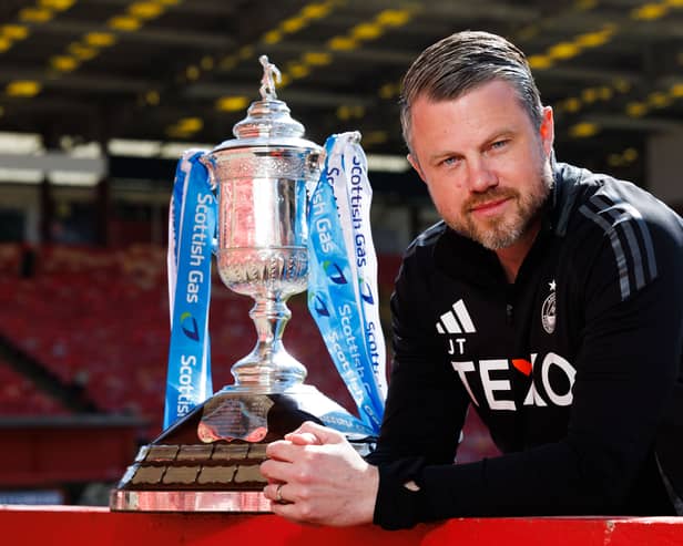 Aberdeen manager Jimmy Thelin with the Scottish Gas Scottish Cup at Pittodrie Stadium, on May 21, 2025. (Photo by Ross Parker / SNS Group)