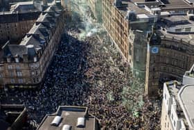 Thousands of Celtic FC fans gathered at Glasgow Cross at the weekend. Picture: John Devlin