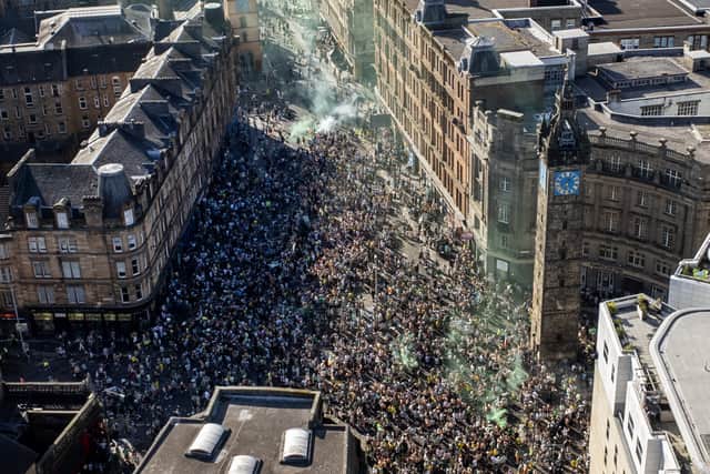Thousands of Celtic FC fans gathered at Glasgow Cross at the weekend. Picture: John Devlin