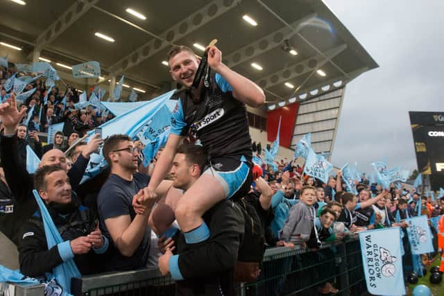 Finn Russell celebrates Glasgow Warriors' win over Munster in the 2015 Pro12 final in Belfast, his only major club honour.