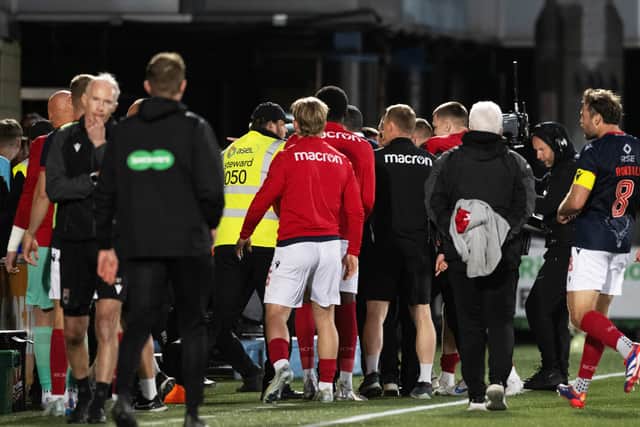 Ross County were left incensed after a fan was alleged to have spat at one of their staff members.