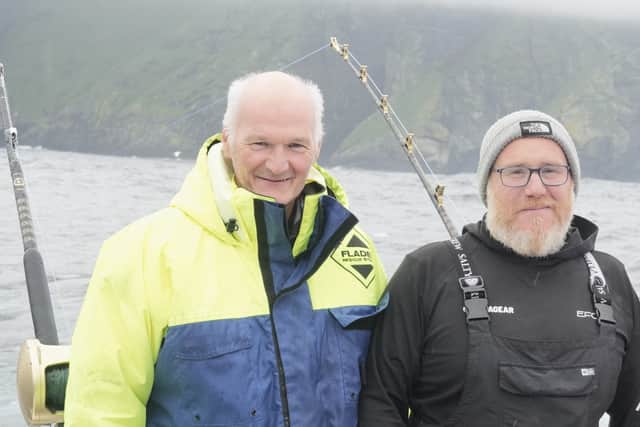 Angus Campbell pictured left with fellow fisherman from Devon, Andy, onboard Harmony
