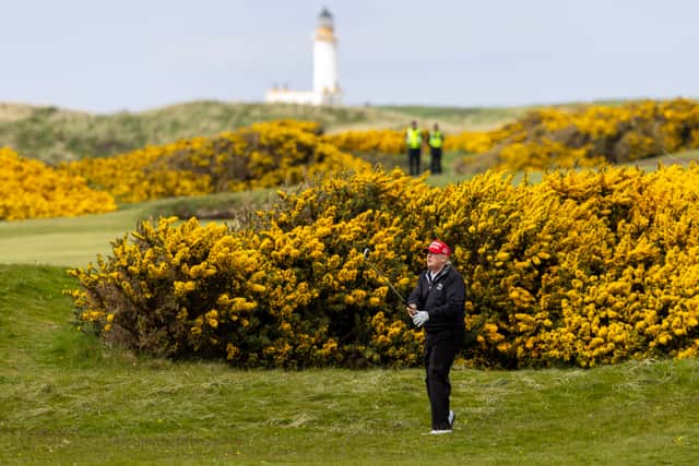 US President Donald Trump plays golf at his Turnberry course in 2023. The policies of the US Government - and rhetoric around them - are reportedly harming tourism in America  and making Americans think twice about travelling. PIC: Getty / Robert Perry.