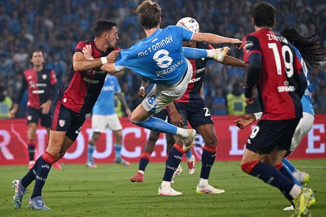 Scott McTominay scores his team's first goal during the Serie A win over Cagliari which sealed the league title. (Photo by Francesco Pecoraro/Getty Images)