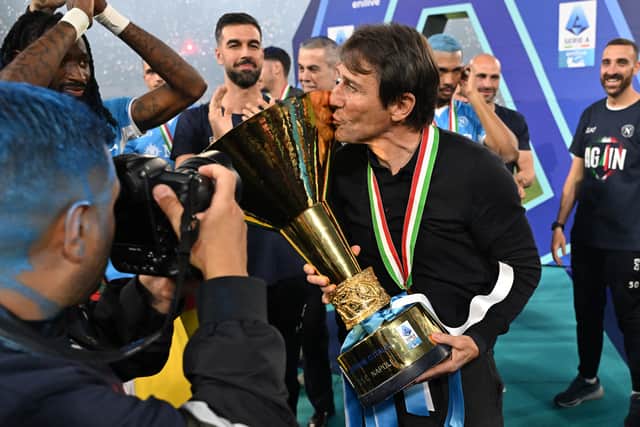 Antonio Conte kisses the Serie A trophy.