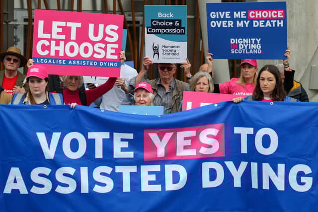 Supporters of the Assisted Dying Bill stage a rally outside the Scottish Parliament (Picture: Jeff J Mitchell)
