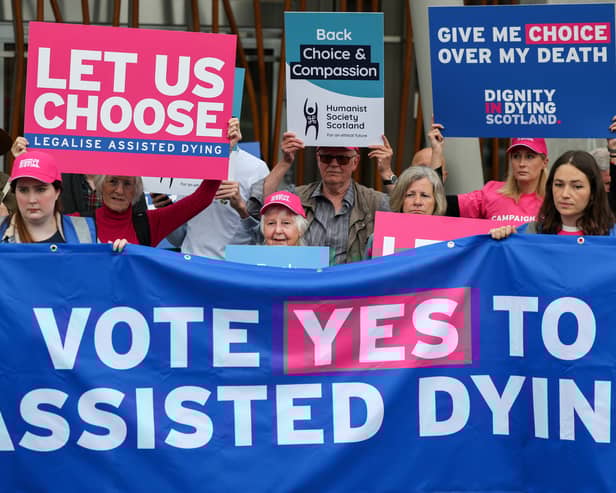 Supporters of the Assisted Dying Bill stage a rally outside the Scottish Parliament (Picture: Jeff J Mitchell)