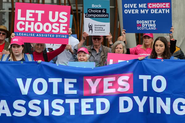 Supporters of the Assisted Dying Bill stage a rally outside the Scottish Parliament (Picture: Jeff J Mitchell)