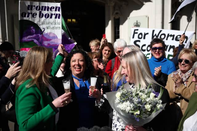 Members of the For Women Scotland campaign group celebrate the Supreme Court ruling about the definition of the word 'woman' (Picture: Henry Nicholls)