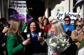 For Women Scotland members (Maya Forstater centre) celebrate outside the UK Supreme Court.