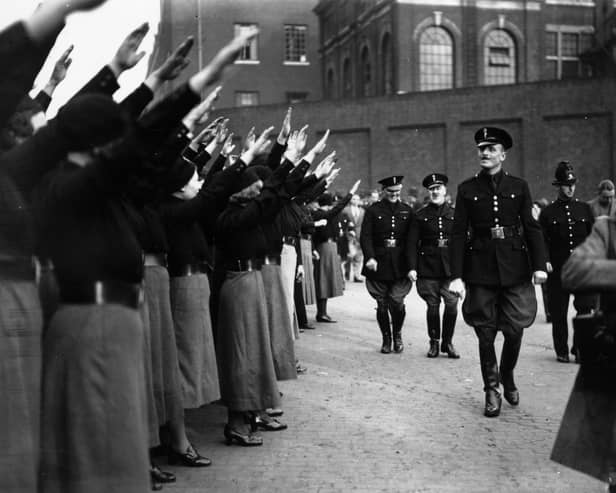 Oswald Mosley, leader of the British Union of Fascists, inspects a parade of supporters before calling off a march through London's East End in 1936 (Picture: Becker/Fox Photos)
