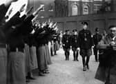 Oswald Mosley, leader of the British Union of Fascists, inspects a parade of supporters before calling off a march through London's East End in 1936 (Picture: Becker/Fox Photos)
