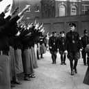 Oswald Mosley, leader of the British Union of Fascists, inspects a parade of supporters before calling off a march through London's East End in 1936 (Picture: Becker/Fox Photos)
