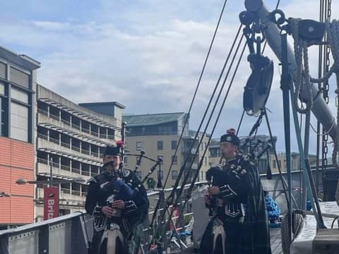 Archie Borthwick and Ollie Little, from the Loretto School Pipe Band piping onboard D/S Hestmanden on Monday.