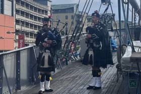 Archie Borthwick and Ollie Little, from the Loretto School Pipe Band piping onboard D/S Hestmanden on Monday.