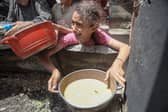 A girl appears to be in distress after receiving food at Jabalia refugee camp, Gaza City, earlier this month (Picture: Abood Abusalama)