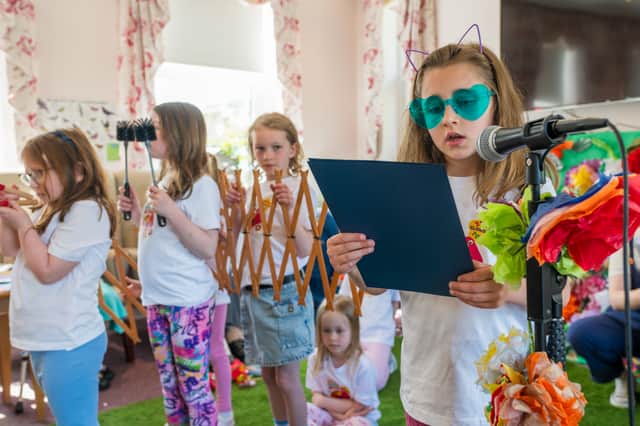 Glow Bugs from Beacon Arts Centre, performing in a local care home.