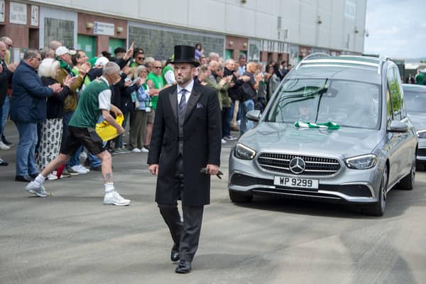 Hibs fans applauded as the hearse made its was through the stadium.