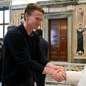 Napoli and Scotland midfielder Scott McTominay (left) shakes hands with Pope Leo XIV during a papal private audience with the team in the Clementine Hall at the Vatican. Picture: Vadican Media via AP