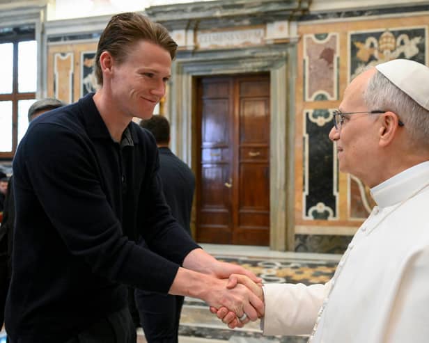 Napoli and Scotland midfielder Scott McTominay (left) shakes hands with Pope Leo XIV during a papal private audience with the team in the Clementine Hall at the Vatican. Picture: Vadican Media via AP