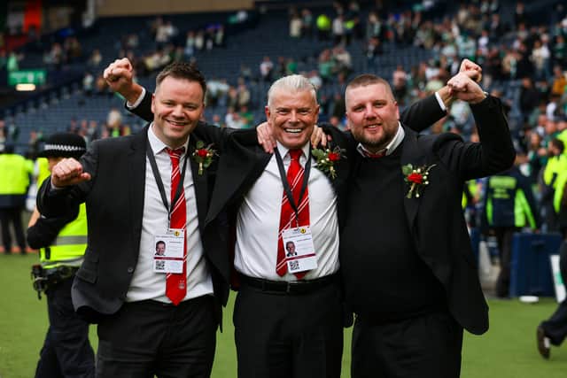 Aberdeen CEO Alan Burrows (right), chairman Dave Cormack (centre) and director of football Steven Gunn celebrate winning the Scottish Cup against Celtic in May.