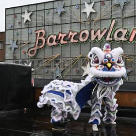 A lion from the Glasgow Hong Lok Dragon Dance Troop (Est 2001) does a dance ahead of the Hong Kong Street Market at the  Barras Market this Saturday and Sunday.