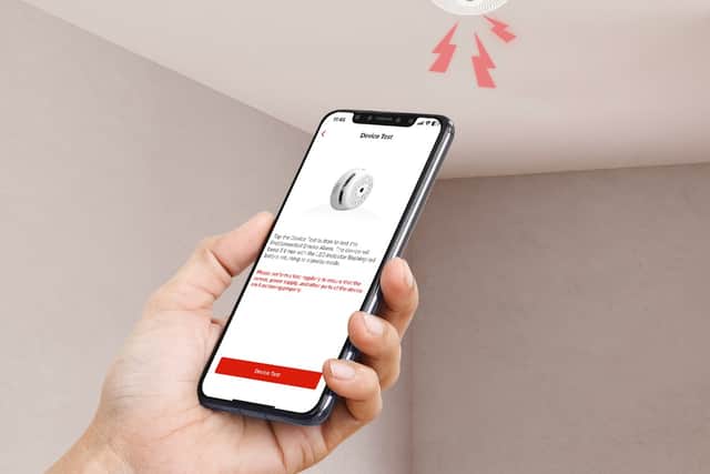 Using an app to test or silence the alarm is so much easier than climbing a ladder